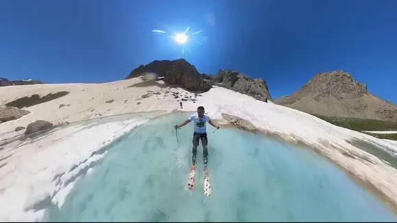2 bin 500 metre rakımdaki buzul gölünde kayak keyfi