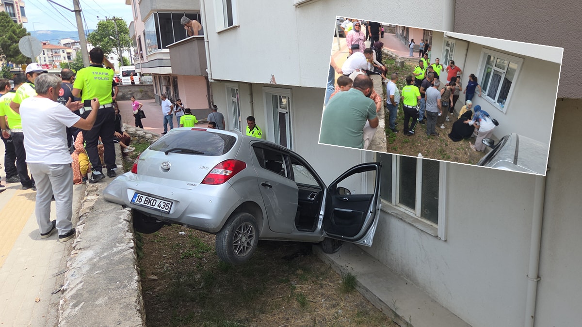 Bahçeye uçan otomobilin arka kısmı kaldırımda asılı kaldı! 3 yaralı