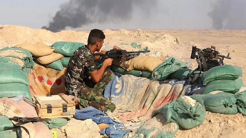 Irak'ta Şii Milis Grubu Silahlarını Hükümete Teslim Etti