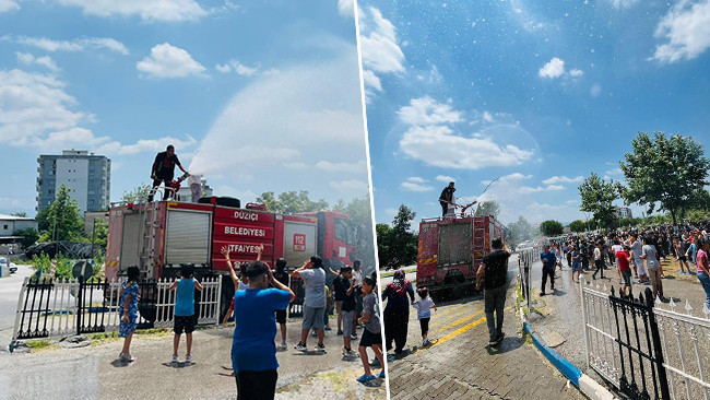 İtfaiyeden sıcakta bunalan gençlere serinleme sürprizi