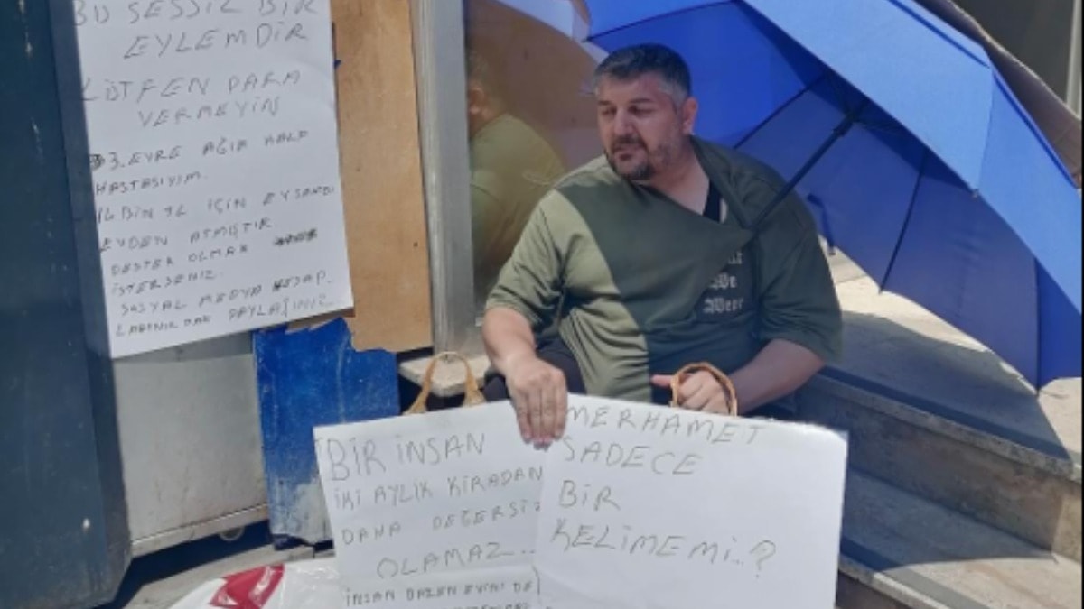 Kalp hastası kiracıdan 'vicdan' pankartlı eylem