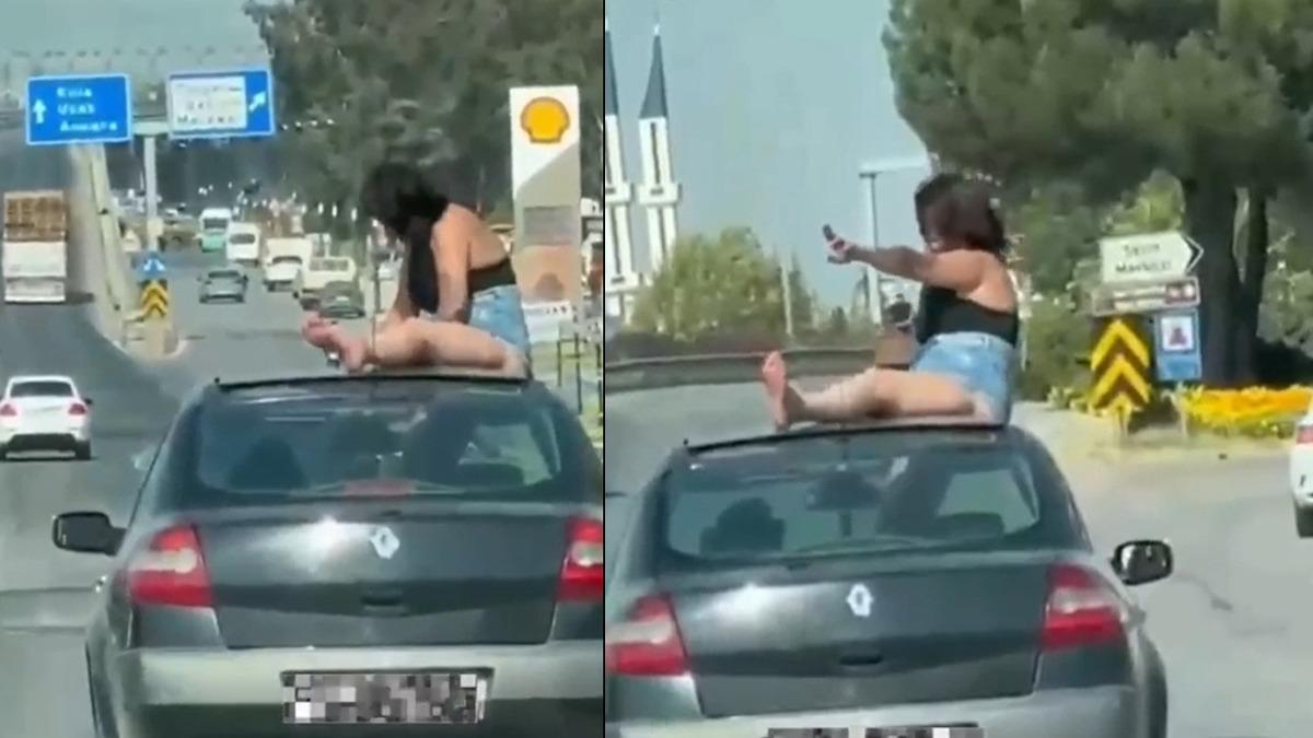 Seyir Halindeki Aracın Tavanına Çıkan Kadın Gözaltına Alındı