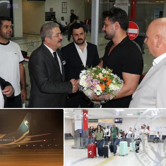 Van-Tahran arası ilk uçuş: İranlı turistler çiçeklerle karşılandı